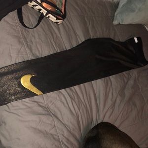 Nike black and gold glitter pants